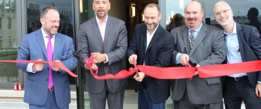Ribbon Cutting At The 810 River Avenue Development